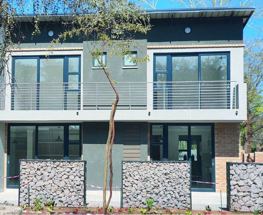 USSD house with gabion walls